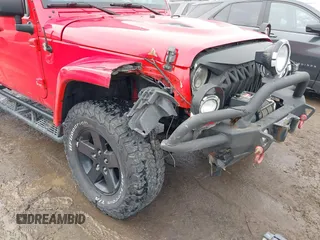 2015 Jeep Wrangler Unlimited Sahara with VIN 1C4BJWEG3FL590491, listed as a IAAI auction lot 41642219 with 148,759 mi miles. Bid and sale history available at carsss.com. Image 6.