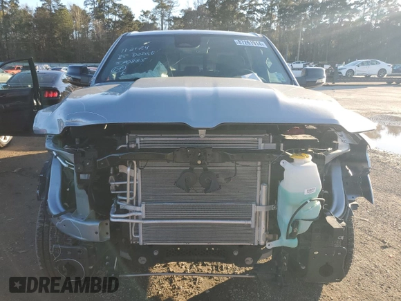 2025 Ram 1500 Big Horn with VIN 1C6RREFG2SN530885, listed as a Copart auction lot 87261914 with 3,814 mi miles and Salvage title. Bid and sale history available at DreamBid. Image 5.