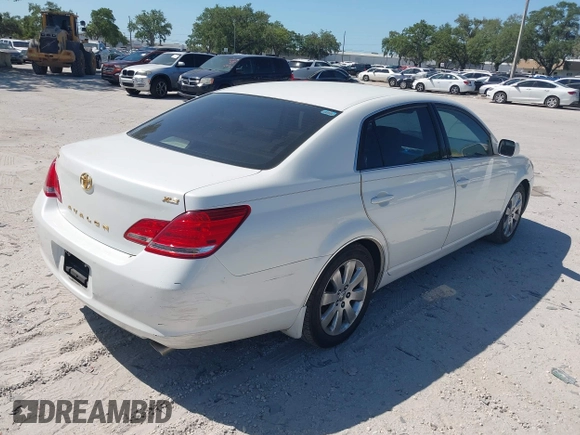 2006 Toyota Avalon XL with VIN 4T1BK36B06U078479, listed as a IAAI auction lot 41940266 with 168,852 mi miles. Bid and sale history available at carsss.com. Image 4.