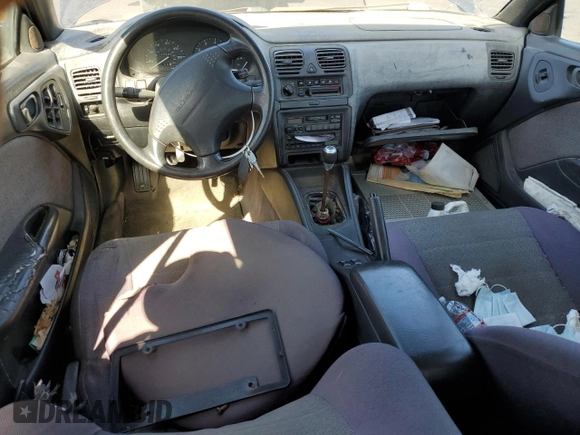 1996 Subaru Legacy with VIN 4S3BG4859T6986223, listed as a Copart auction lot 57683345 with 265,568 mi miles and Salvage title. Bid and sale history available at DreamBid. Image 8.