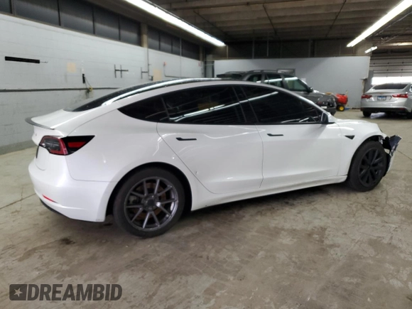 2021 Tesla Model 3 Standard Range Plus z VIN 5YJ3E1EA4MF943036, wystawiony jako Copart lot #54008355 z przebiegiem 62 981 mil mil oraz Szkoda całkowita • Salvage title. Historia ofert i sprzedaży dostępna na DreamBid. Obrazek 3.
