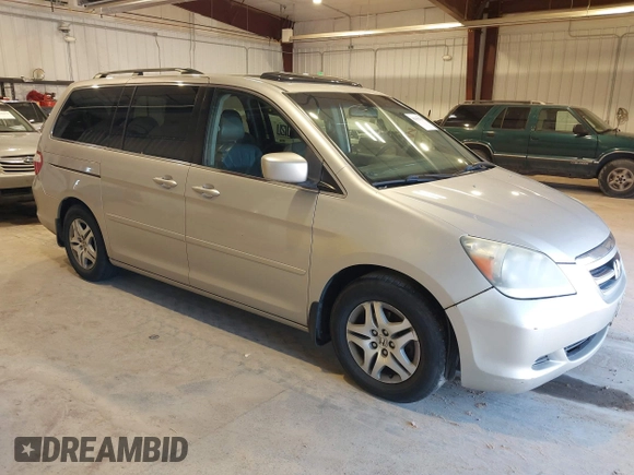 2006 Honda Odyssey EX-L with VIN 5FNRL387X6B449343, listed as a IAAI auction lot 42162759 with 242,590 mi miles. Bid and sale history available at carsss.com. Image 1.