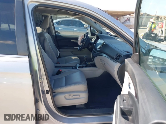 2020 Honda Pilot EX-L with VIN 5FNYF5H46LB004744, listed as a IAAI auction lot 42095298 with 76,159 mi miles and . Bid and sale history available at DreamBid. Image 5.