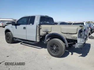 2004 Ford F-150 XLT with VIN 1FTPX14584NA82865, listed as a Copart auction lot 64094845 with 218,027 mi miles and Salvage title. Bid and sale history available at DreamBid. Image 2.