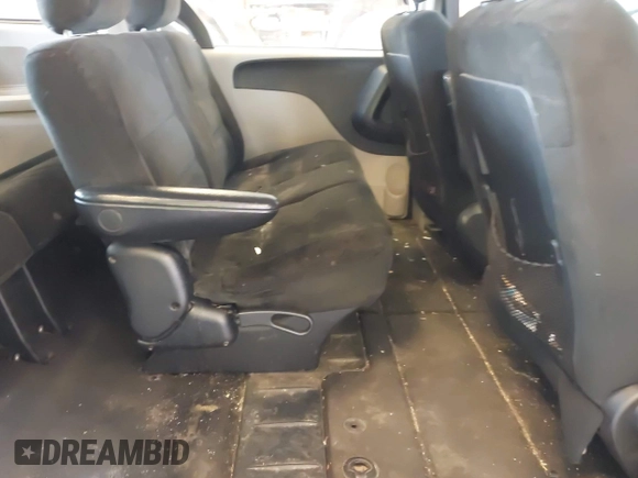 2016 Dodge Grand Caravan SE with VIN 2C4RDGBG1GR117200, listed as a IAAI auction lot 42104773 with 121,007 mi miles and . Bid and sale history available at DreamBid. Image 8.