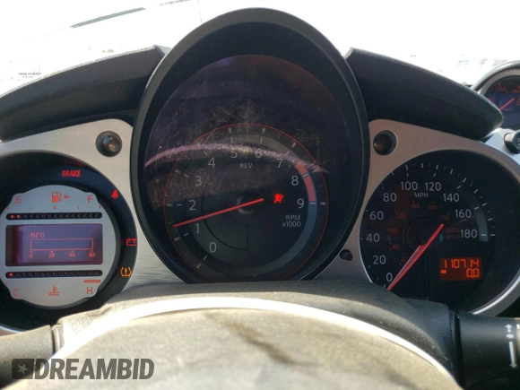 2011 Nissan 370Z Touring z VIN JN1AZ4EHXBM553057, wystawiony jako Copart lot #58557165 z przebiegiem 110 714 mil mil oraz Szkoda całkowita • Salvage title. Historia ofert i sprzedaży dostępna na DreamBid. Obrazek 9.