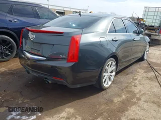 2014 Cadillac ATS Performance with VIN 1G6AC5S35E0116188, listed as a IAAI auction lot 41860494 with 85,517 mi miles. Bid and sale history available at carsss.com. Image 4.