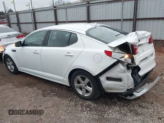 2015 Kia Optima LX with VIN KNAGM4A74F5587415, listed as a IAAI auction lot 41184428 with 128,549 mi miles. Bid and sale history available at carsss.com. Image 14.