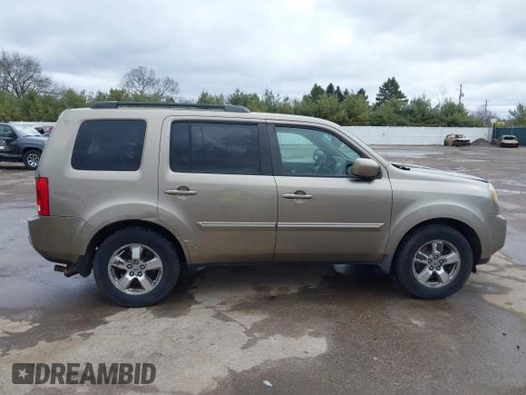 2009 Honda Pilot EX-L with VIN 5FNYF48569B002035, listed as a IAAI auction lot 41838347 with 198,849 mi miles. Bid and sale history available at carsss.com. Image 14.