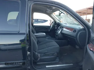2008 GMC Yukon SLT w/4SB with VIN 1GKFC13J18R260916, listed as a IAAI auction lot 41261518 with 221,104 mi miles. Bid and sale history available at carsss.com. Image 5.