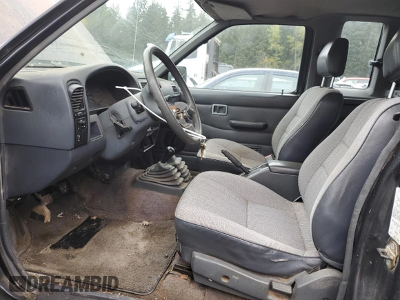 1994 Nissan Frontier SE with VIN 1N6HD16Y2RC362723, listed as a Copart auction lot 76174864 with 197,707 mi miles and Clean title. Bid and sale history available at DreamBid. Image 7.