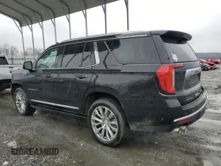 2023 GMC Yukon Denali with VIN 1GKS1DKL8PR402542, listed as a Copart auction lot 42001695 with 23,497 mi miles and Salvage Title. Bid and sale history available at carsss.com. Image 2.