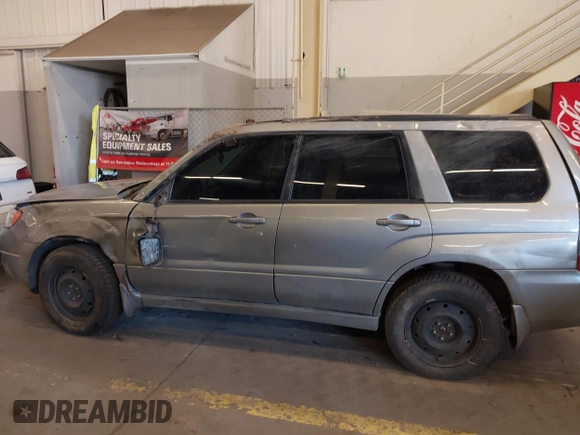 2007 Subaru Forester X w/Premium Pkg with VIN JF1SG65657H719525, listed as a IAAI auction lot 41696437 with 217,895 mi miles. Bid and sale history available at carsss.com. Image 14.
