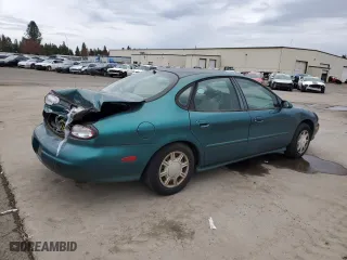 1998 Ford Taurus LX with VIN 1FAFP52U1WA103181, listed as a Copart auction lot 49817955 with 196,913 mi miles and Salvage Title. Bid and sale history available at carsss.com. Image 3.