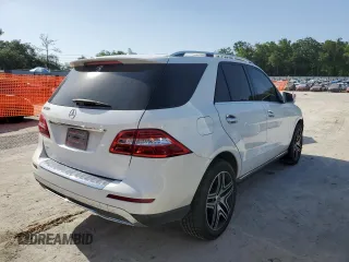 2014 Mercedes-Benz M 350 with VIN 4JGDA5JB0EA283475, listed as a Copart auction lot 57140295 with 105,777 mi miles and Salvage title. Bid and sale history available at DreamBid. Image 3.