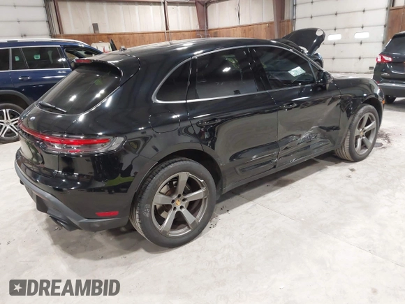 2022 Porsche Macan with VIN WP1AA2A54NLB11338, listed as a IAAI auction lot 42476948 with 34,906 mi miles and . Bid and sale history available at DreamBid. Image 4.