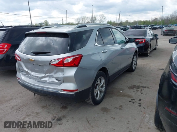 2018 Chevrolet Equinox Premier with VIN 2GNAXMEV7J6106781, listed as a IAAI auction lot 42113301 with 114,585 mi miles. Bid and sale history available at carsss.com. Image 4.