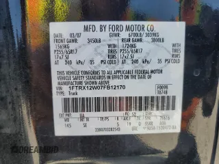 2007 Ford F-150 STX with VIN 1FTRX12W07FB12170, listed as a Copart auction lot 50452015 with 169,814 mi miles and Salvage title. Bid and sale history available at DreamBid. Image 12.