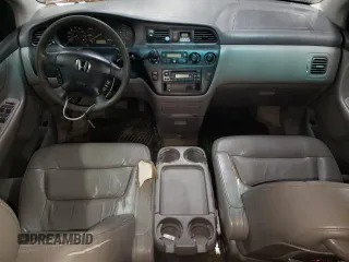 2004 Honda Odyssey EX-L with VIN 5FNRL189X4B098131, listed as a Copart auction lot 47294865 with 196,581 mi miles and Salvage Title. Bid and sale history available at DreamBid. Image 8.