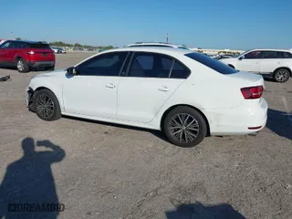 2018 Volkswagen Jetta 1.4T SE with VIN 3VWDB7AJXJM225016, listed as a IAAI auction lot 41309884 with 57,773 mi miles. Bid and sale history available at carsss.com. Image 3.