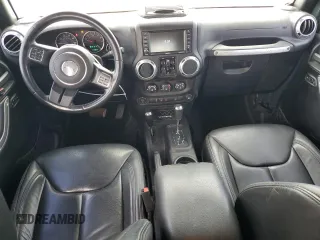 2016 Jeep Wrangler Unlimited Sahara with VIN 1C4HJWEG8GL275844, listed as a Copart auction lot 58997665 with 71,583 mi miles and Salvage title. Bid and sale history available at DreamBid. Image 8.