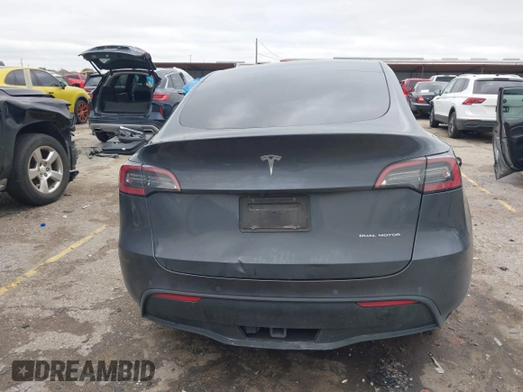 2023 Tesla Model Y Long Range with VIN 7SAYGAEE8PF587202, listed as a IAAI auction lot 41306811 with 1 mi miles. Bid and sale history available at carsss.com. Image 15.