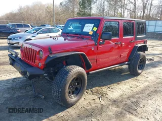 2014 Jeep Wrangler Unlimited Sport with VIN 1C4BJWDG2EL126480, listed as a IAAI auction lot 41479323 with 93,192 mi miles. Bid and sale history available at carsss.com. Image 2.