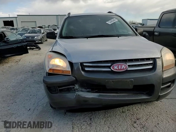 2005 Kia Sportage LX with VIN KNDJF723457132535, listed as a Copart auction lot 52460445 with 180,110 mi miles and Salvage Title. Bid and sale history available at carsss.com. Image 11.