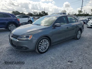 2014 Volkswagen Jetta TDI w/Premium with VIN 3VWLL7AJ7EM436916, listed as a Copart auction lot 58238385 with 103,265 mi miles and Salvage title. Bid and sale history available at DreamBid. Image 1.