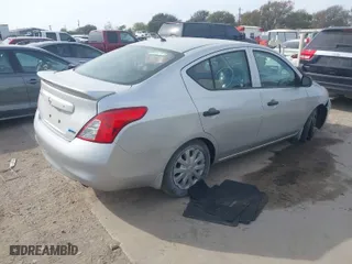 2014 Nissan Versa SV with VIN 3N1CN7AP6EL855396, listed as a IAAI auction lot 40965122 with 121,151 mi miles. Bid and sale history available at carsss.com. Image 4.