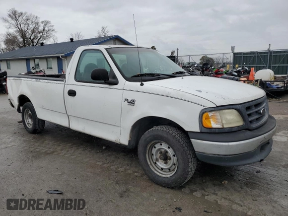 2000 Ford F-150 XL с VIN 1FTRF17W2YKA55667, выставлен на аукционе Copart как лот 83191704 с пробегом Не указан миль и Списание • Salvage title. История ставок и продаж доступна на DreamBid. Изображение 4.