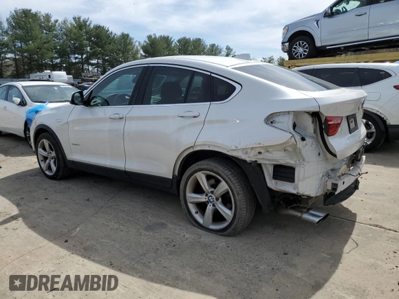 2015 BMW X4 xDrive28i with VIN 5UXXW3C59F0F89517, listed as a Copart auction lot 49989304 with 65,554 mi miles. Bid and sale history available at carsss.com. Image 2.