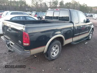 1999 Ford F-150 XL with VIN 1FTRX17L1XNB98741, listed as a IAAI auction lot 41113649 with Not Provided miles. Bid and sale history available at carsss.com. Image 4.