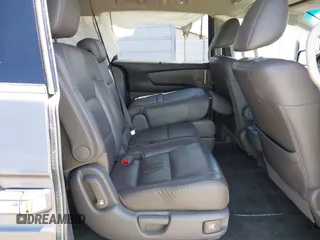 2012 Honda Odyssey Touring with VIN 5FNRL5H98CB011297, listed as a IAAI auction lot 42207061 with 154,073 mi miles and . Bid and sale history available at DreamBid. Image 8.