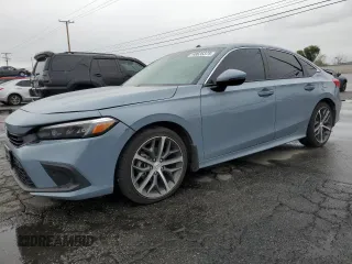 2023 Honda Civic Sedan Touring with VIN 2HGFE1F99PH322358, listed as a Copart auction lot 48635375 with 18,262 mi miles and Salvage Title. Bid and sale history available at carsss.com. Image 1.
