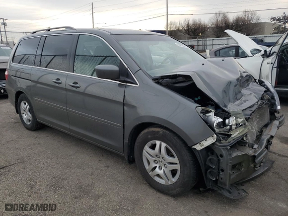 2007 Honda Odyssey EX-L with VIN 5FNRL38657B132143, listed as a Copart auction lot 49620235 with 0 mi miles and Salvage Title. Bid and sale history available at carsss.com. Image 4.