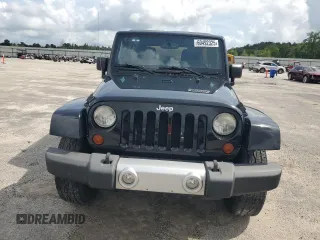 2013 Jeep Wrangler Unlimited Sahara with VIN 1C4HJWEG9DL701391, listed as a Copart auction lot 60492325 with 117,584 mi miles and Salvage title. Bid and sale history available at DreamBid. Image 5.