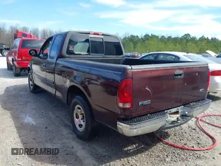 2000 Ford F-150 XL with VIN 1FTZX1725YNB34291, listed as a IAAI auction lot 41831745 with 207,119 mi miles. Bid and sale history available at carsss.com. Image 6.