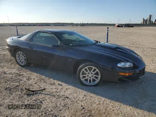 2000 Chevrolet Camaro Z28 z VIN 2G1FP22G3Y2123001, wystawiony jako Copart lot #85730994 z przebiegiem 32 579 mil mil oraz Szkoda całkowita • Salvage title. Historia ofert i sprzedaży dostępna na DreamBid. Obrazek 4.