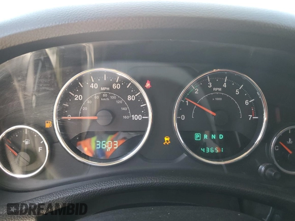 2012 Jeep Wrangler Unlimited Call of Duty MW3 with VIN 1C4BJWFG9CL199551, listed as a Copart auction lot 57097555 with 43,651 mi miles and Salvage title. Bid and sale history available at DreamBid. Image 9.