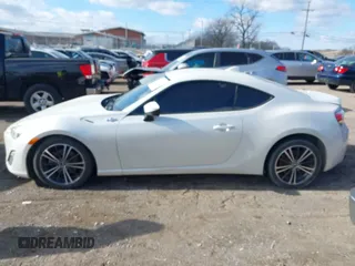 2015 Scion FR-S with VIN JF1ZNAA13F8707454, listed as a IAAI auction lot 41239233 with 130,126 mi miles. Bid and sale history available at carsss.com. Image 13.