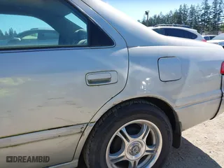 2000 Toyota Camry CE with VIN JT2BG22K6Y0451632, listed as a IAAI auction lot 42030842 with 200,734 mi miles. Bid and sale history available at carsss.com. Image 6.