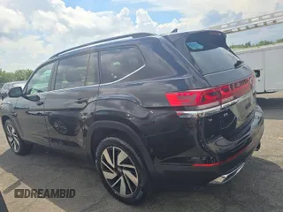2024 Volkswagen Atlas SE with VIN 1V2HR2CA1RC579096, listed as a IAAI auction lot 42751185 with 15,477 mi miles and . Bid and sale history available at DreamBid. Image 6.