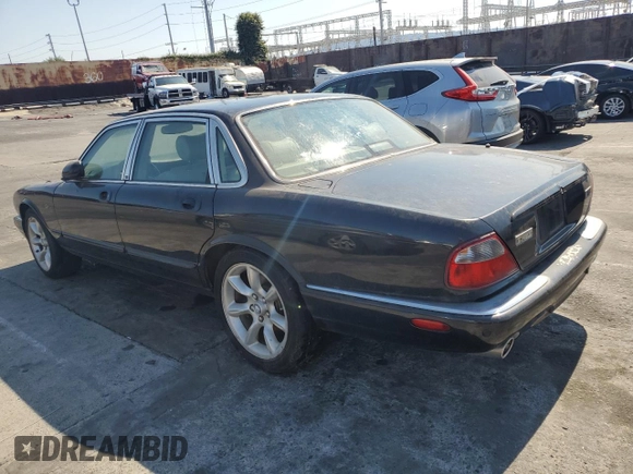 2003 Jaguar XJ with VIN SAJDA15B63MF52618, listed as a Copart auction lot 64336415 with Not provided miles and Clean title. Bid and sale history available at DreamBid. Image 2.