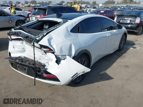 2024 Toyota Prius LE with VIN JTDACAAU1R3016240, listed as a IAAI auction lot 41169729 with 79,725 mi miles. Bid and sale history available at carsss.com. Image 4.