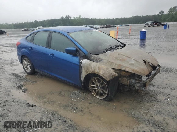 2018 Ford Focus SE z VIN 1FADP3FE6JL227653, wystawiony jako Copart lot #56827585 z przebiegiem Nie podano mil oraz Szkoda całkowita • Salvage title. Historia ofert i sprzedaży dostępna na DreamBid. Obrazek 4.