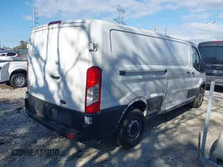 2023 Ford Transit Cargo with VIN 1FTBR1Y82PKA22661, listed as a IAAI auction lot 41768039 with 30,800 mi miles and . Bid and sale history available at DreamBid. Image 4.