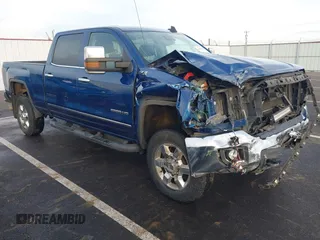 2015 GMC Sierra 2500HD SLT z VIN 1GT12ZE84FF574009, wystawiony jako IAAI lot #41048785 z przebiegiem 167 845 mil mil oraz . Historia ofert i sprzedaży dostępna na DreamBid. Obrazek 1.