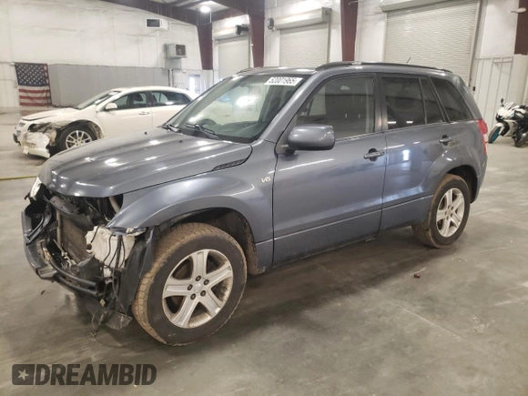 2007 Suzuki Grand Vitara Luxury z VIN JS3TD947774200407, wystawiony jako Copart lot #52001965 z przebiegiem Nie podano mil oraz Szkoda całkowita • Salvage title. Historia ofert i sprzedaży dostępna na DreamBid. Obrazek 1.