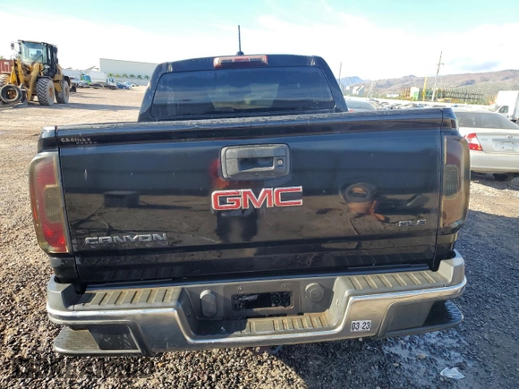 2016 GMC Canyon 2WD SLE with VIN 1GTG5CE35G1256661, listed as a Copart auction lot 82244644 with 104,496 mi miles and Clean Title. Bid and sale history available at carsss.com. Image 6.